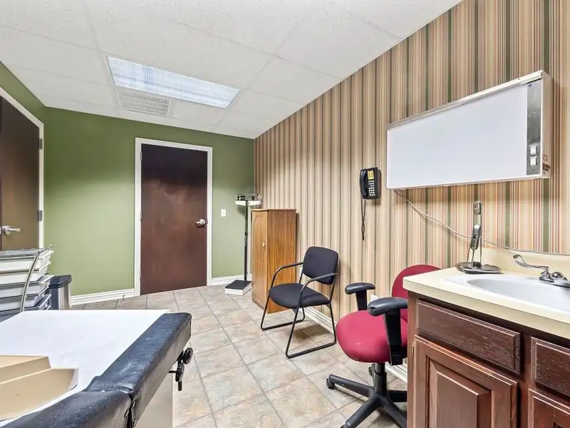 Versatile 2,752 Sq Ft Office Building in Central Rogers with Five Private Offices