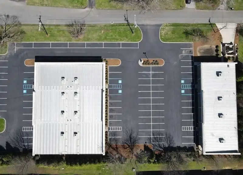 Class a Office Condo Complex with 7 Leased Units in Prime City Location