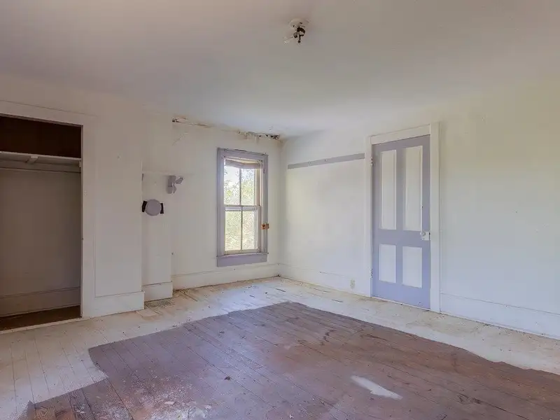 Classic American Foursquare Home in Need of Restoration with Detached Garage