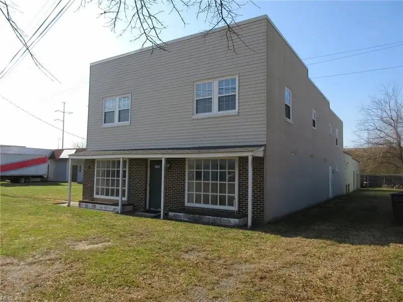 2-story Commercial Building with Office, Warehouse, and Apartments in W Pembroke