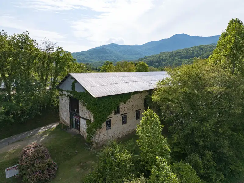 Historic 1918 Stone Building with 3.99 Acres and Detached Workshop in Balsam Road Area