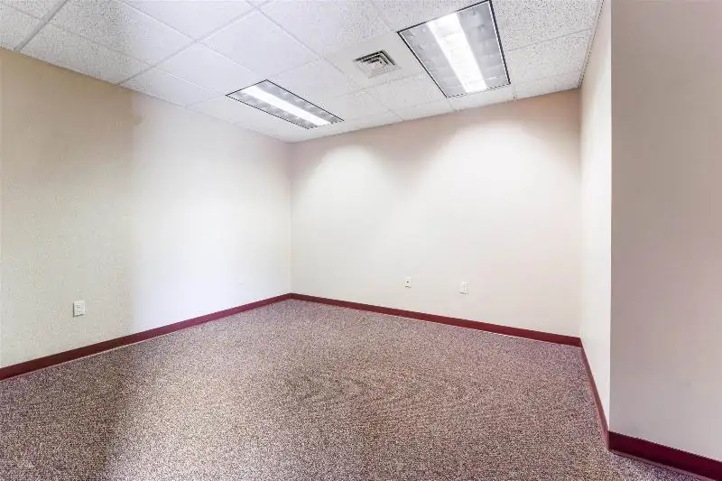 Versatile Commercial Condo for Sale Near Hwy 151 & 41 with Multiple Offices and Amenities
