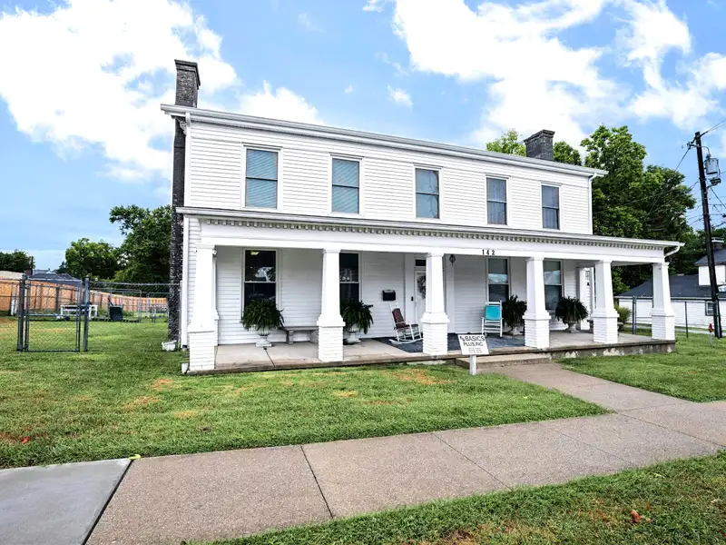 Historic 1850s Two-story Home in Central Business District of Versailles
