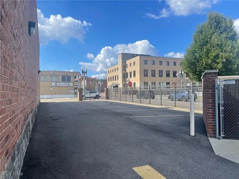 Well-maintained Two-story Brick Building with Retail and Workshop Space in Ne Location