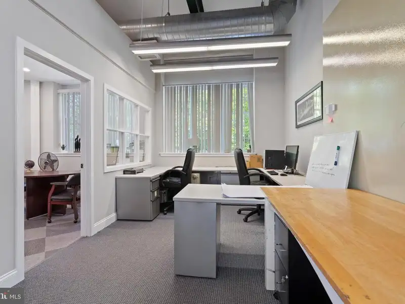 Historic 1921 Office Building in Wallingford with Ample Parking and Strong Investment Potential