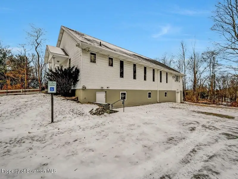 Versatile Former Church Building in Peaceful Location with Ample Parking and Creative Potential