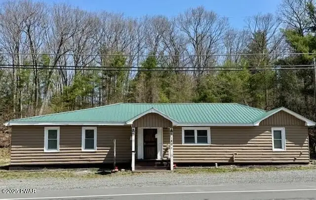 Versatile Commercial/residential Property with 2-bed Apartment and Office/retail Space on Route 6