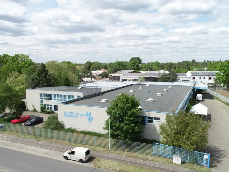 Versatile Commercial Property for Sale: 6,604 M² with Production Halls and Office Space