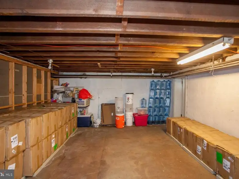 Multi-unit Building with Commercial Space and Two Residential Apartments in Established Location