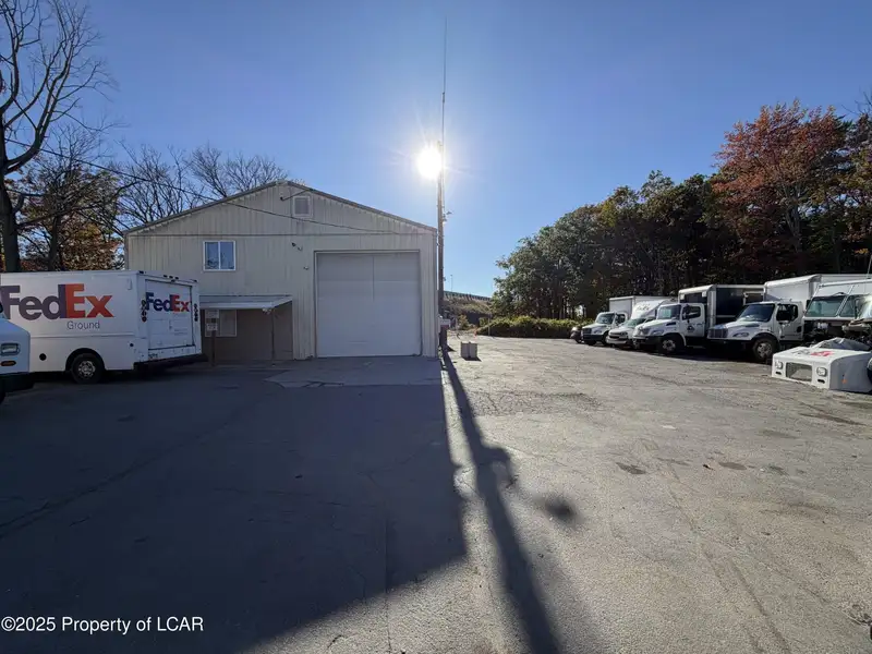 For Lease: 2,400 Sf Garage/warehouse with Office and Three Vehicle Lifts