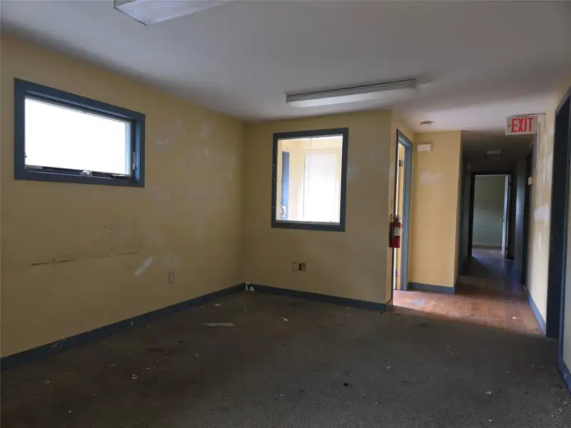 Free-standing Office Space with Multiple Offices and Ample Parking in Prime Location