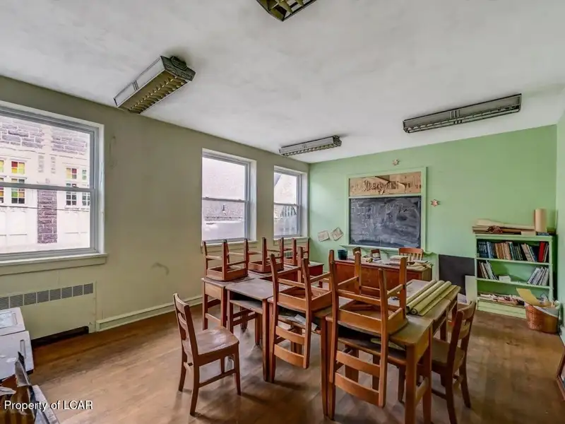 Versatile Downtown Hazleton Building: Former Worship Space with Offices/classrooms Potential