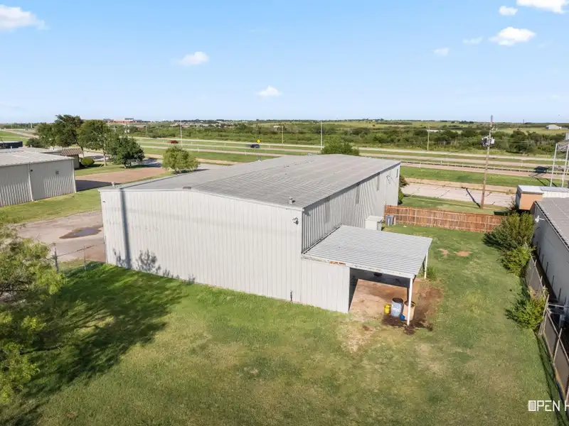 Insulated Warehouse and Office Space with Crane, Fenced Yard in Prime Location