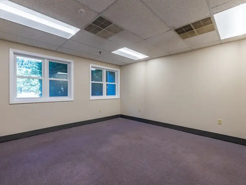Freestanding Four-story Office Building with Parking on Route 114, North Andover