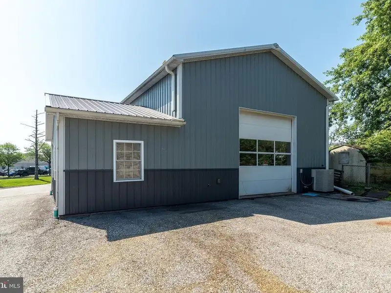 Auto Repair Shop with Residential Income Opportunity in Prime Location