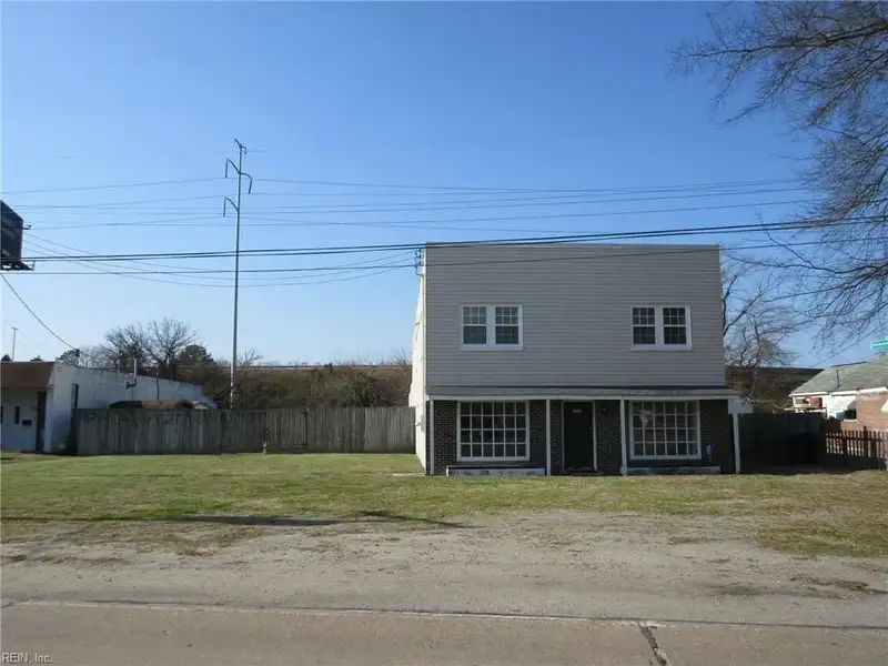 2-story Commercial Building with Office, Warehouse, and Apartments in W Pembroke