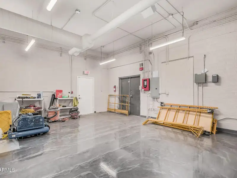 Versatile Commercial Property with Two Buildings and Ample Parking in Prime Location