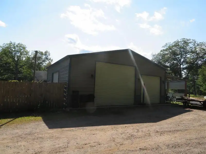 Turnkey Bar/restaurant with Apartment, Highway Access, and Development Potential in Northwoods