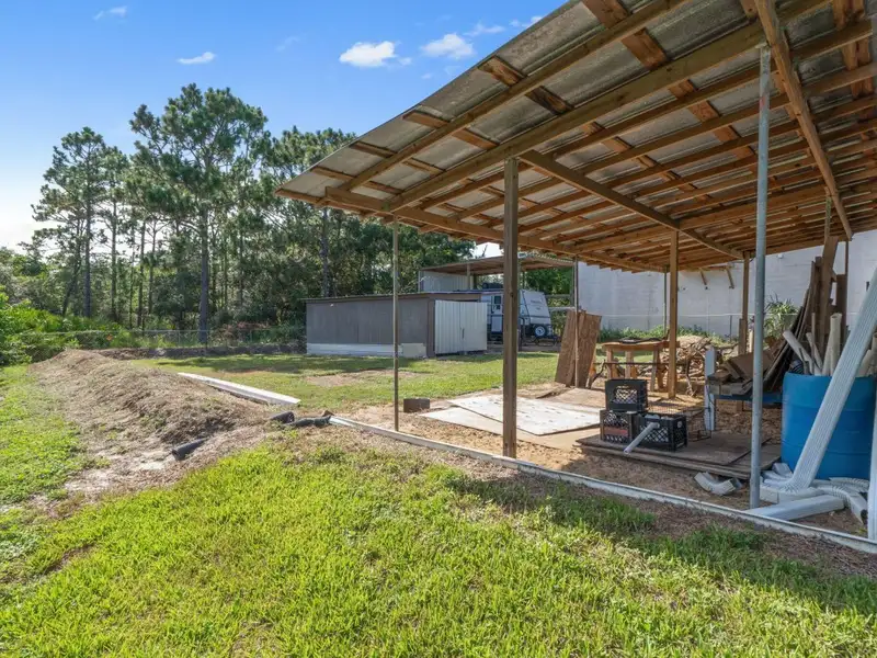 30x30 Enclosed Quonset Building with Pole Barn and Storage on Hwy 98