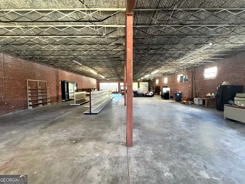 Versatile 5,000 Sq Ft Warehouse Near Downtown Gainesville with Dock and Roll-up Doors