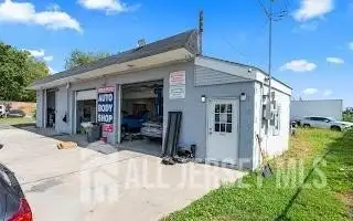 Turnkey Automotive Business with Car Dealership, Mechanic & Auto Body Shop in Prime Location