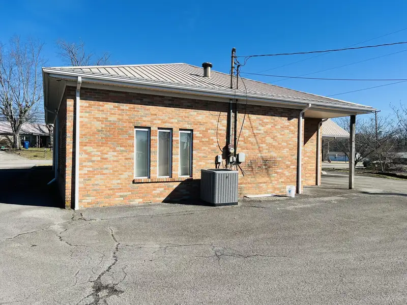 Historic Downtown Brick Building with Vault, Ideal for Office or Retail Conversion
