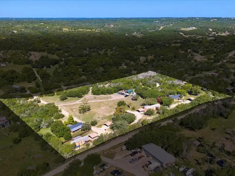 10-acre Mobile Home Community with 5 Units, Fenced, Workshop, and Growth Potential