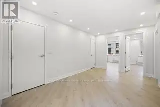 Renovated 2nd Floor Condo in Mid-town Toronto with Luxury Finishes and Modern Amenities