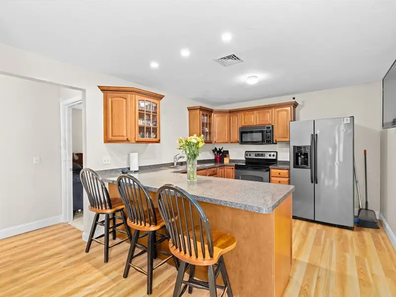 Versatile Multi-use Property with In-law Suite Potential and Heated Pool on Route 28