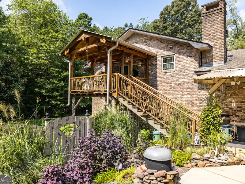 27 Acres with 2,400 Sq. Ft. Home, Duplexes, Pool, and Barn in Prime Location