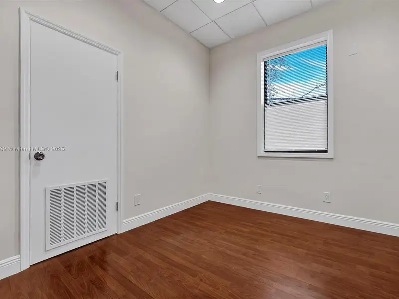 Renovated Office Building with 24 Surface Parking Spaces, On-site Management