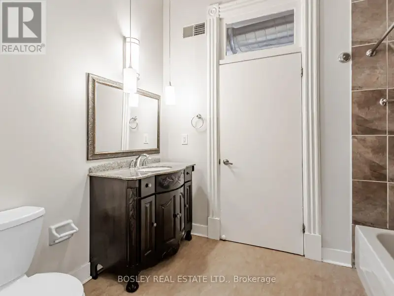 Charming Two-storey Apartment in Landmark Building on Queen St West