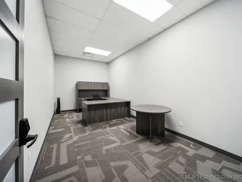 Historic Office Building with 9 Private Suites and Conference Room in Prime Location