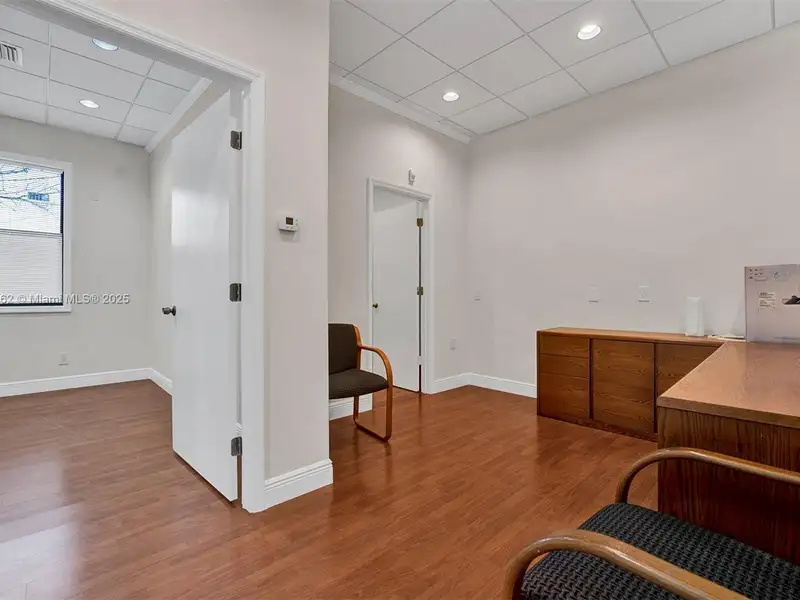 Renovated Office Building with 24 Surface Parking Spaces, On-site Management