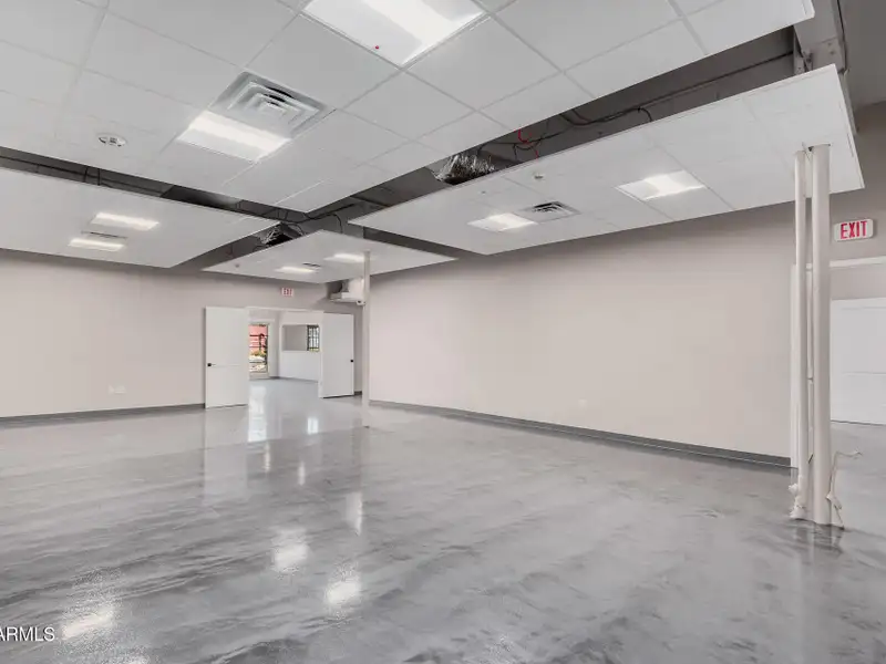 Versatile Commercial Property with Two Buildings and Ample Parking in Prime Location