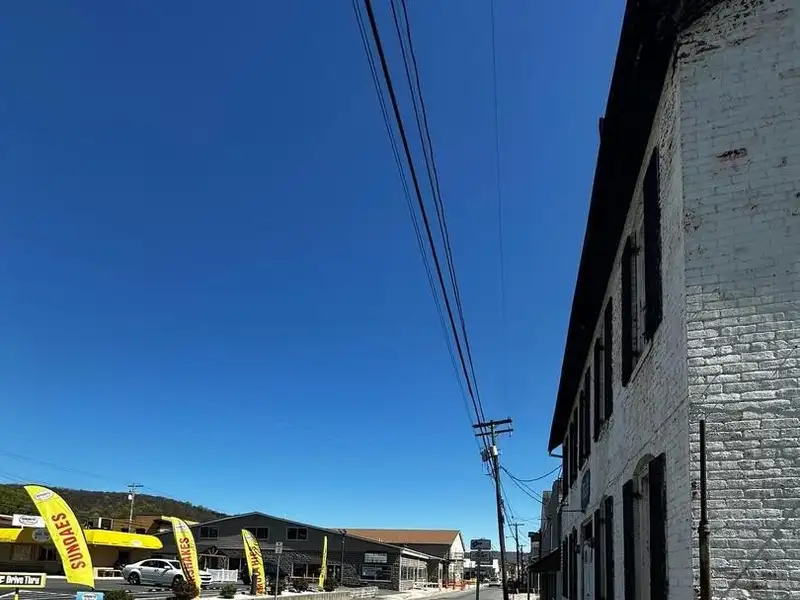 Large Commercial Building with Unique Floor Plan and Adjacent City-owned Lot for Sale