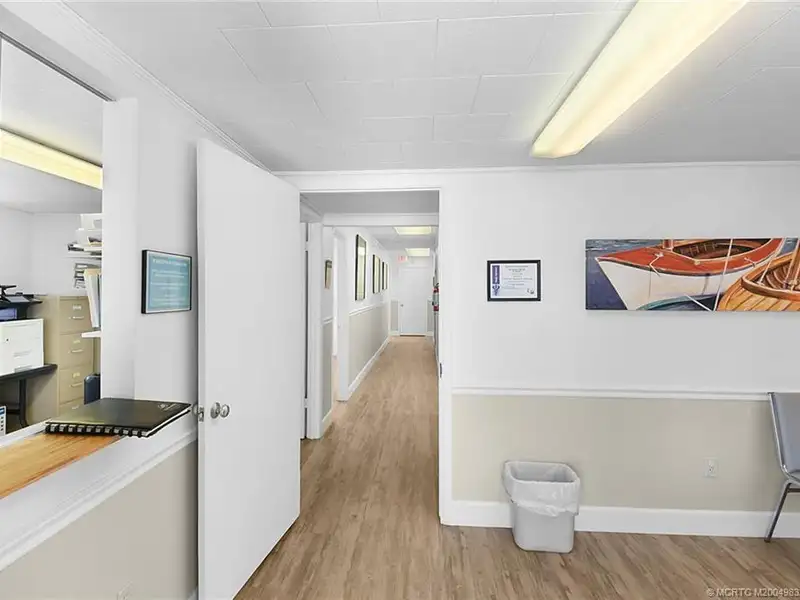 Versatile Office Building with Therapy Rooms and Break Area in R-3a Zoning