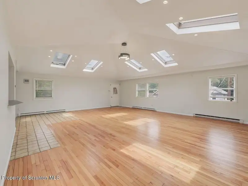 Mixed-use Property in Throop: 7-bay Garage and Updated 2-bedroom Apartment