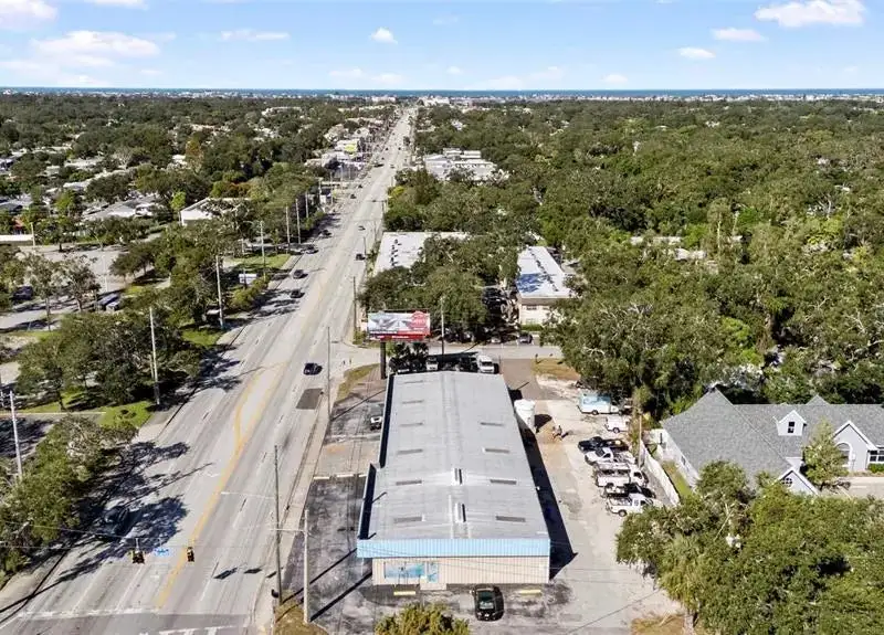 Retail Property on West Bay Drive with 7,250 Sf Building and Corner Lot
