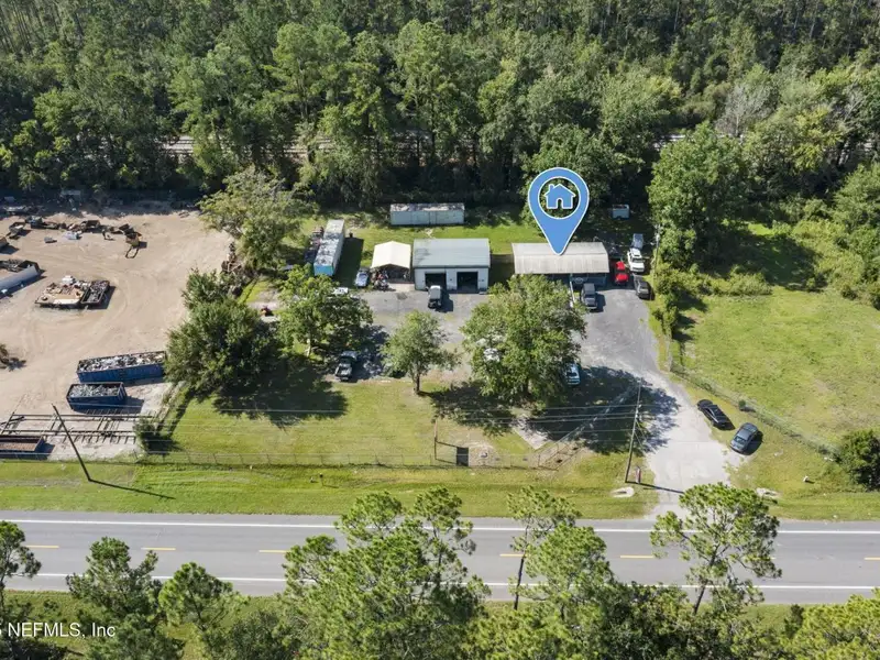 Mixed-use Parcel with Buildings, Ideal for Auto Repair or Sales in Convenient Location