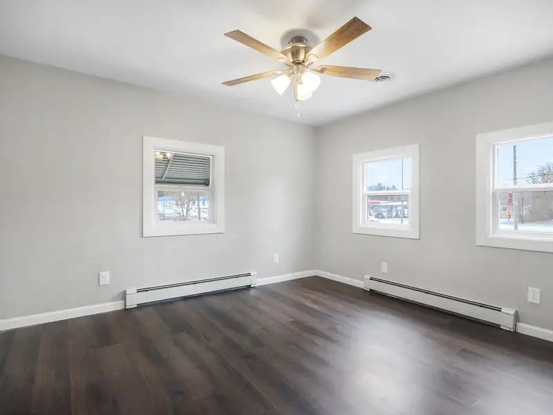 Mixed-use Two Unit Building with Remodeled Three Bedroom Apartment in Prime Location
