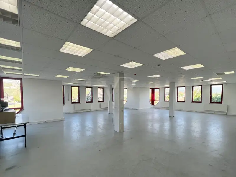 Versatile Company Building with Apartments, Offices, and Storage in Prime Location
