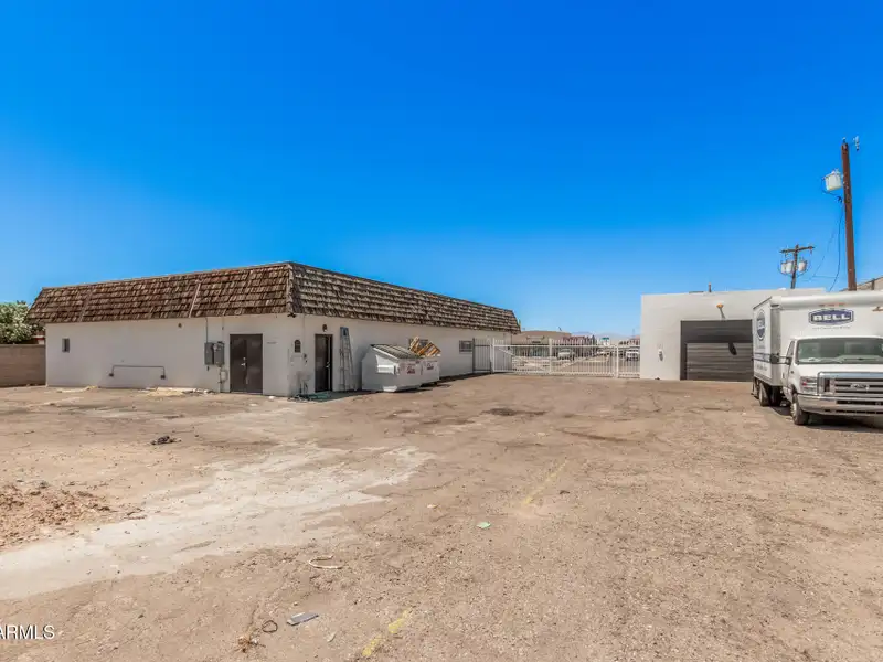 Versatile Commercial Property with Two Buildings and Ample Parking in Prime Location