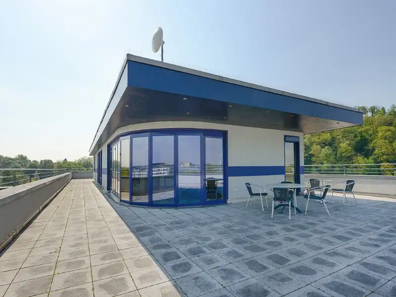 Modern Office Building with Renovated Spaces Near Centro Oberhausen, Includes Garden and Parking
