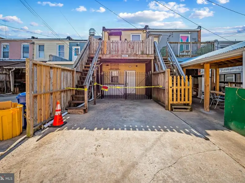 Multi-story Mixed-use Property with Apartment Potential in Prime Location