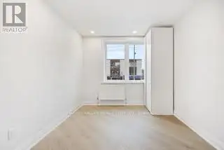Renovated 2nd Floor Condo in Mid-town Toronto with Luxury Finishes and Modern Amenities