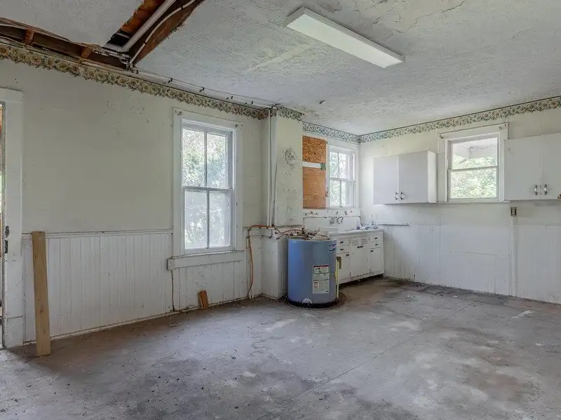 Classic American Foursquare Home in Need of Restoration with Detached Garage