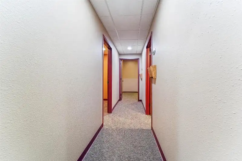 Versatile Commercial Condo for Sale Near Hwy 151 & 41 with Multiple Offices and Amenities