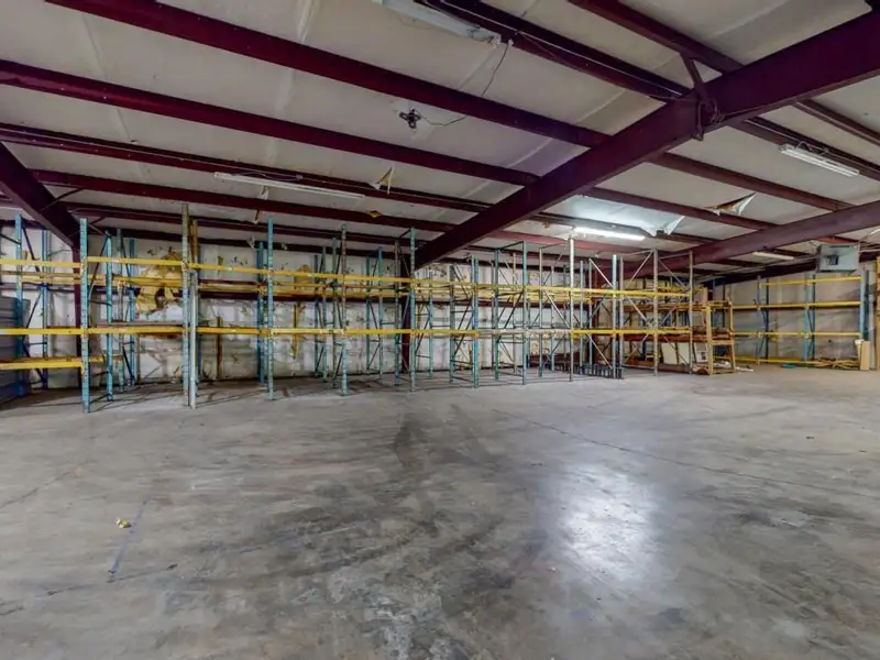 Commercial Property on Busy Highway - 2.1 Acres, 31,000 Sq Ft with Offices and Roll-up Doors