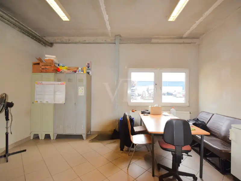 Versatile Industrial Property with Halls, Offices, and Open Space in Prime Location